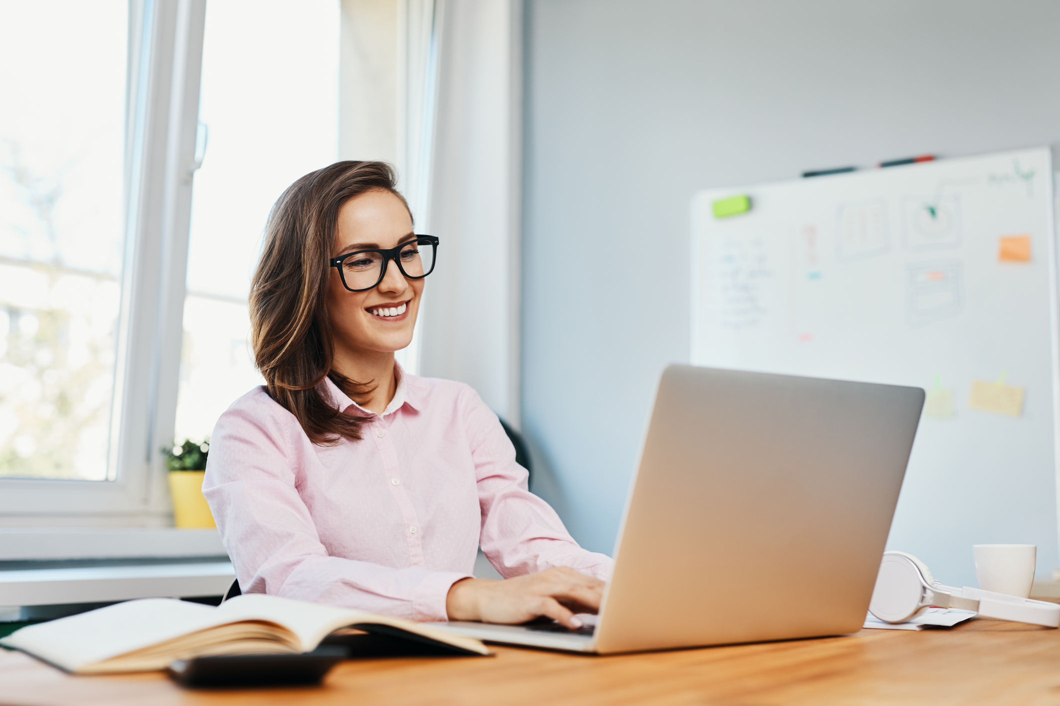 Woman working on a laptop